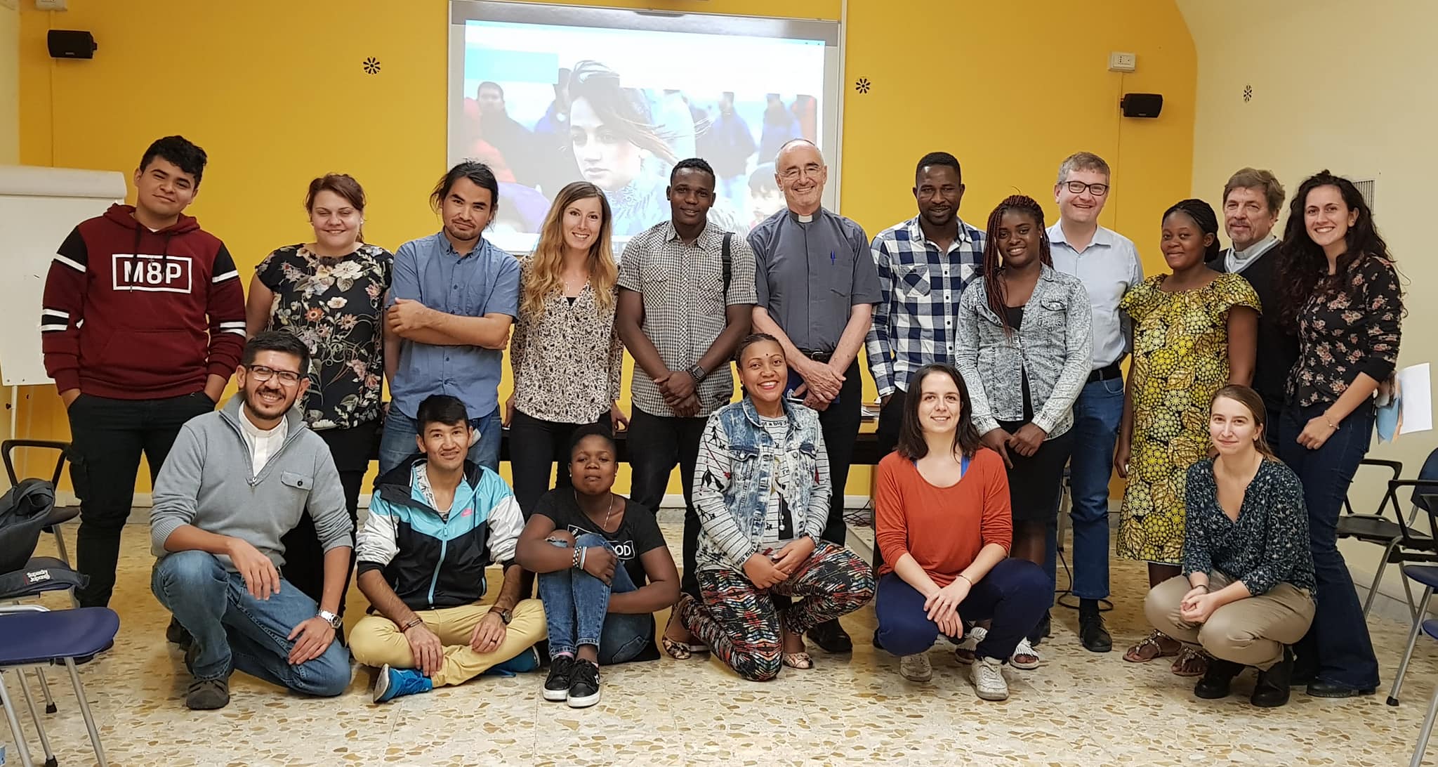 synod group photo czerny Migrants and Refugees