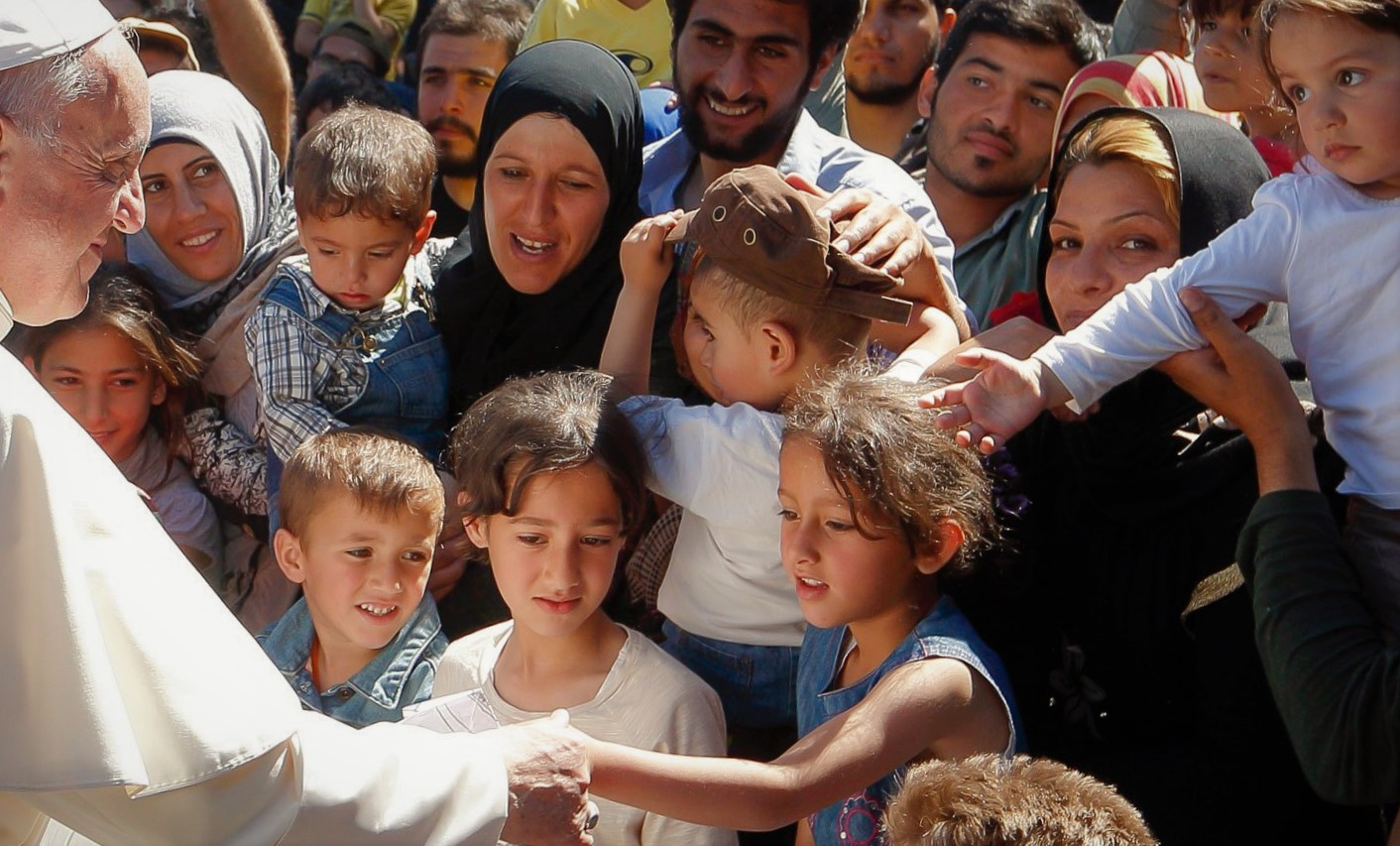 pope francis with refugees Migrants and Refugees